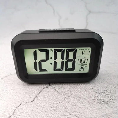 Battery Powered Mini Digital Alarm Clock Temperature Date Week Backlight Snooze Mute Table Clock 12/24H Countdown LCD Clock